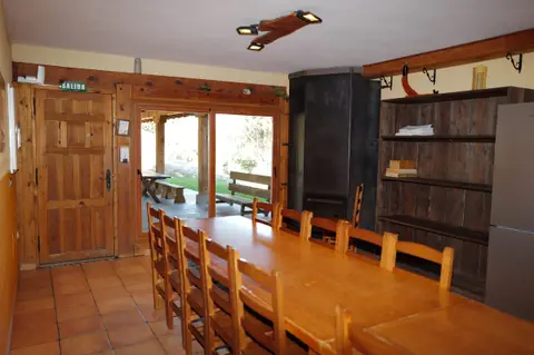 Comedor con puerta al porche